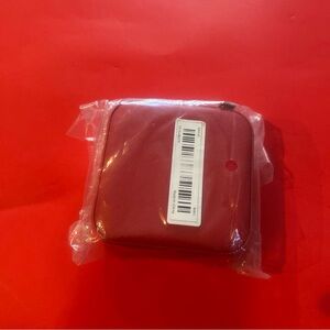 Brand new red leather mini jewelry case.